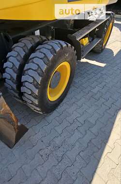 Колесный экскаватор New Holland MH 3.6 2009 в 