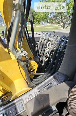 Колесный экскаватор New Holland MH 3.6 2009 в 