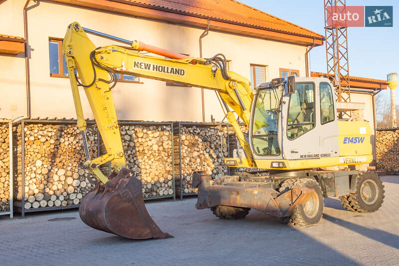 Колесный экскаватор New Holland MH 3.6 2003 в Житомире фото 11 Колесный экскаватор New Holland MH 3.6 2003 в Житомире