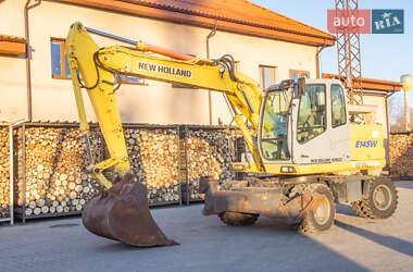 Колесный экскаватор New Holland MH 3.6 2003 в 