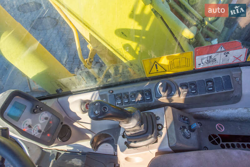 Колесный экскаватор New Holland MH 3.6 2003 в Житомире фото 14 Колесный экскаватор New Holland MH 3.6 2003 в Житомире