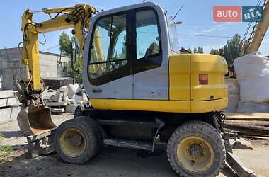 Екскаватор навантажувач New Holland MH 3.6 2007 в 