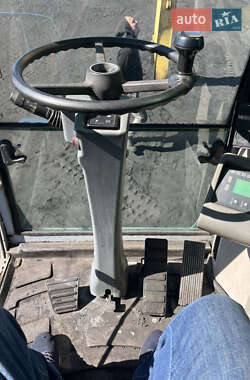 Колесный экскаватор New Holland MH 6.6 2005 в 