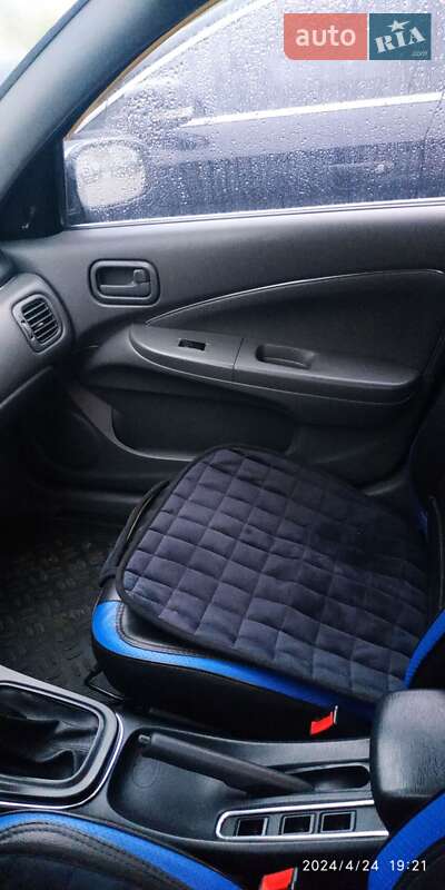 Седан Nissan Almera 2012 в Буче