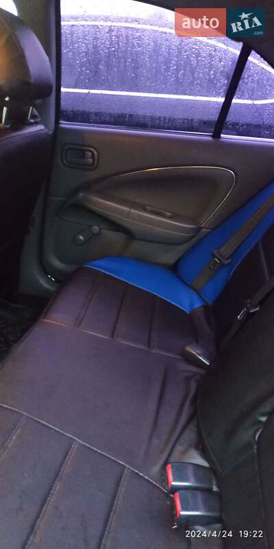 Седан Nissan Almera 2012 в Буче