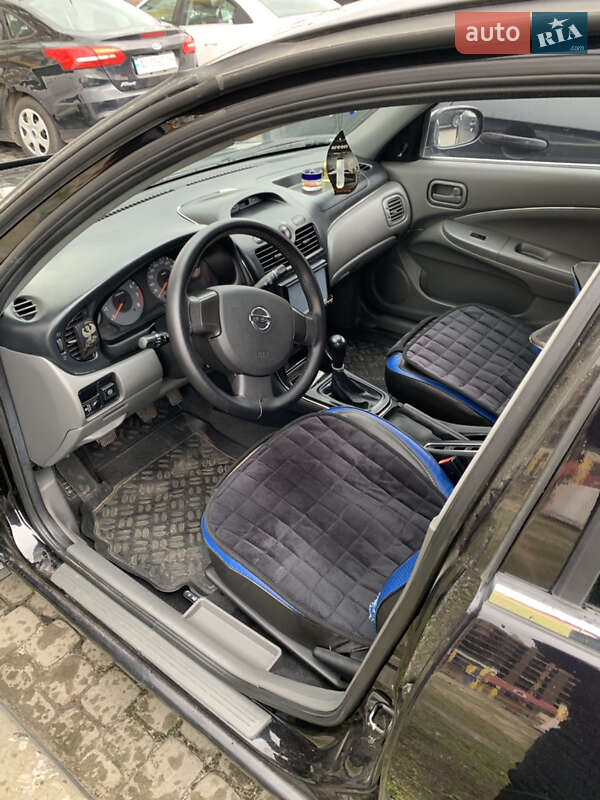 Седан Nissan Almera 2012 в Буче