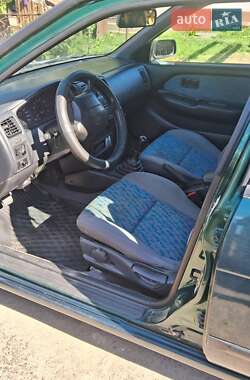 Хэтчбек Nissan Almera 1997 в 