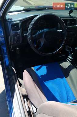 Хэтчбек Nissan Almera 1998 в 