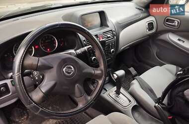 Хэтчбек Nissan Almera 2003 в 