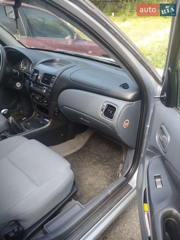 Хетчбек Nissan Almera 2006 в Житомирі