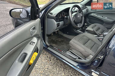Седан Nissan Almera 2006 в  фото 15 Седан Nissan Almera 2006 в