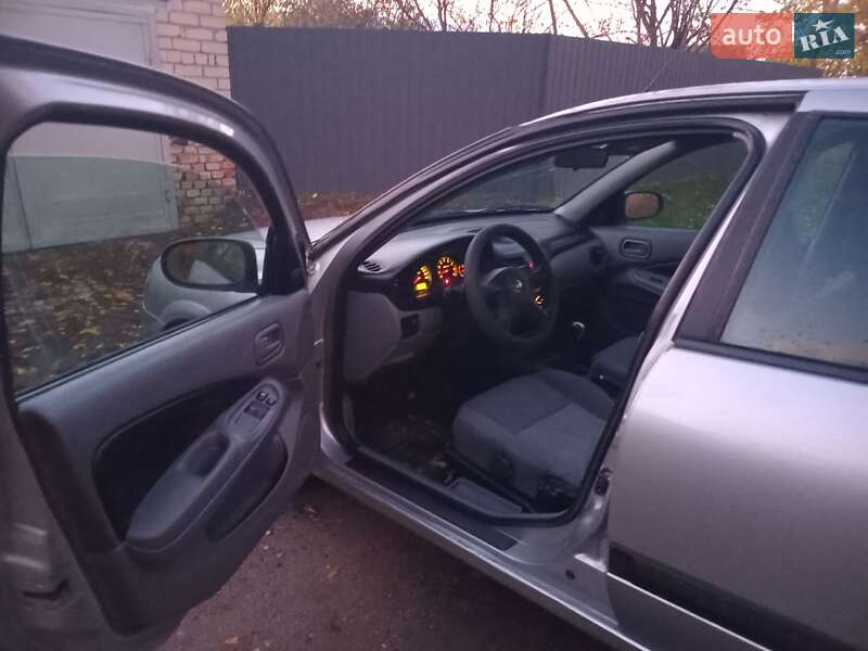 Хэтчбек Nissan Almera 2003 в Пушкаровке фото 9 Хэтчбек Nissan Almera 2003 в Пушкаровке