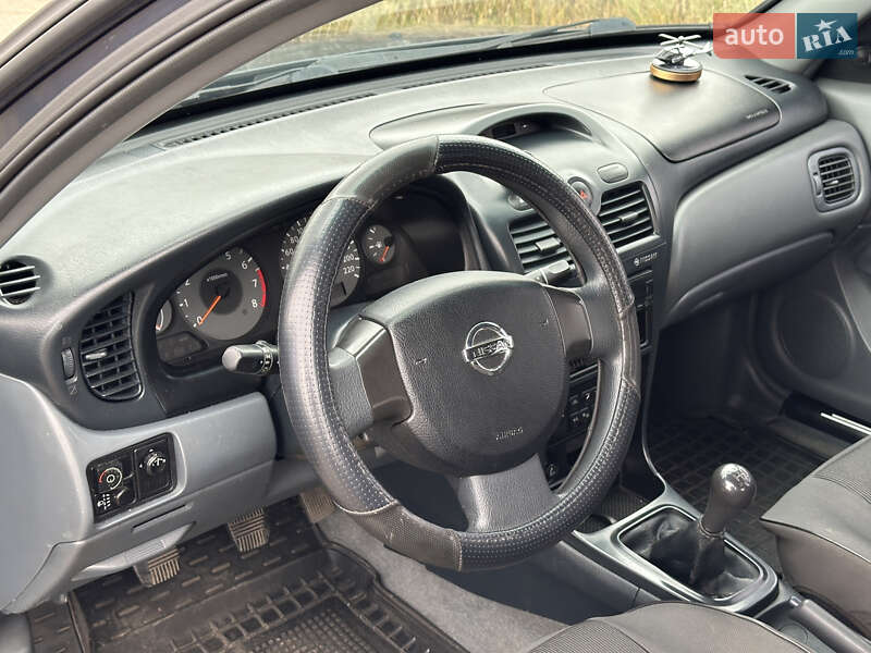 Седан Nissan Almera 2006 в Мене