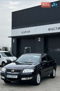 Седан Nissan Almera 2010 в Хусті