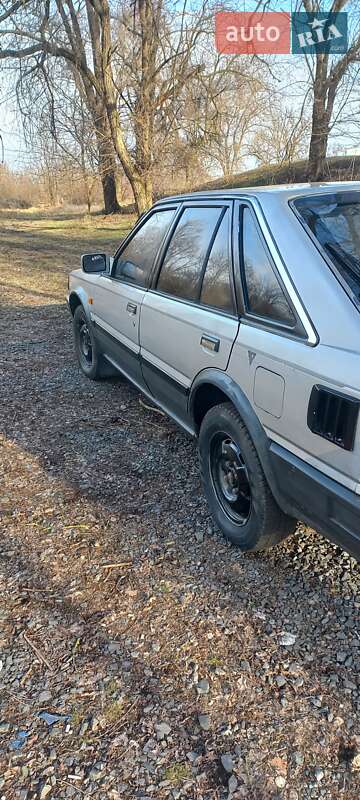 Седан Nissan Bluebird 1987 в Широком