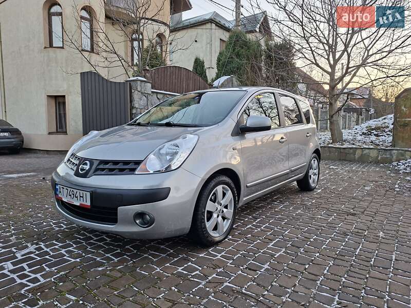 2006 Nissan Note, VIN SJNFCAE11U1064582:plate — фото 1 (autoria)