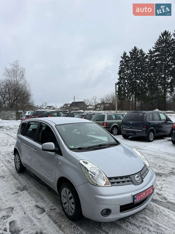 2008 Nissan Note, VIN SJNFAAE11U1285358:plate — фото 1 (autoria)