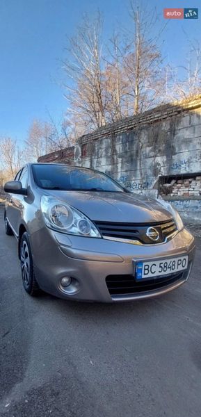 2009 Nissan Note, VIN SJNFCAE11U2025164:plate — фото 1 (autoria)