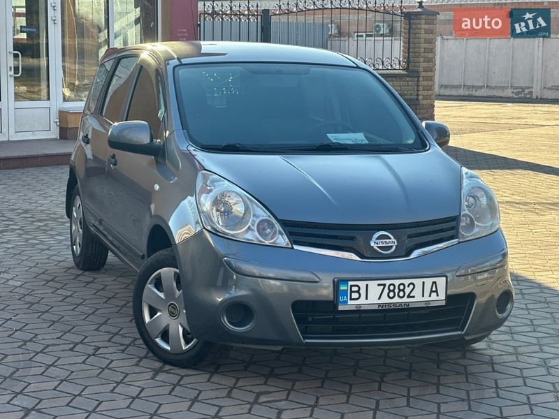2013 Nissan Note, VIN SJNFAAE11U2211743:plate — фото 1 (autoria)