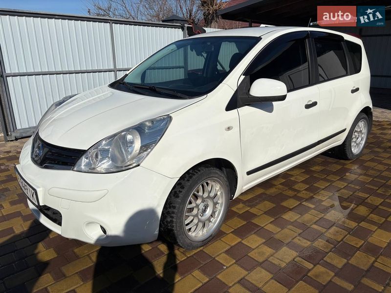 2011 Nissan Note, VIN SJNFCAE11U2140060:plate — фото 1 (autoria)
