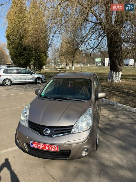 2009 Nissan Note, VIN SJNFAAE11U2009630:plate — фото 1 (autoria)