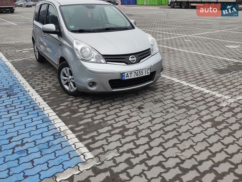 2009 Nissan Note, VIN SJNFCAE11U2033990:plate — фото 1 (autoria)