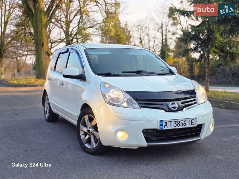 2011 Nissan Note, VIN SJNFDAE11U2135214:plate — фото 1 (autoria)