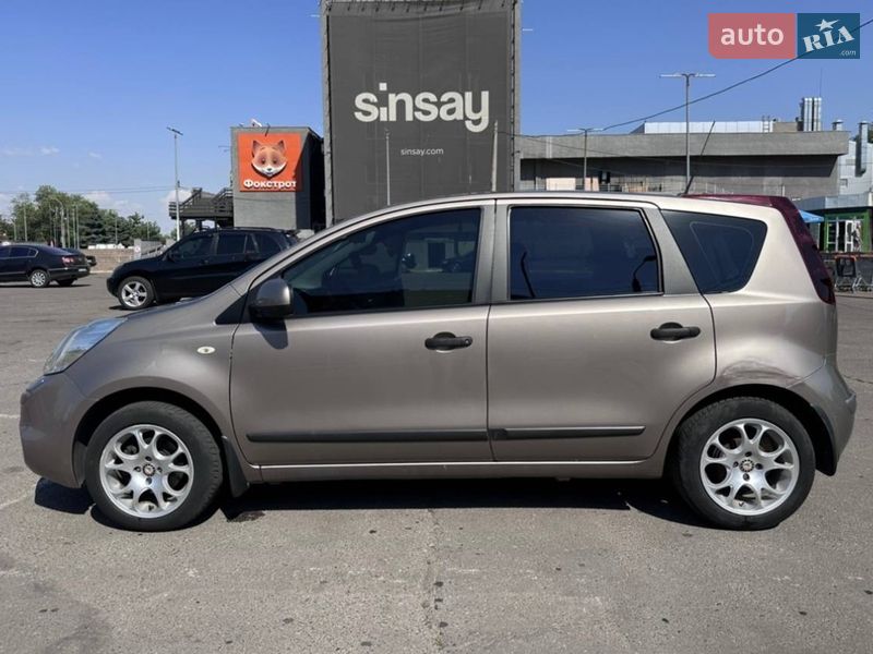 2010 Nissan Note, VIN SJNFCAE11U2058391:plate — фото 1 (autoria)