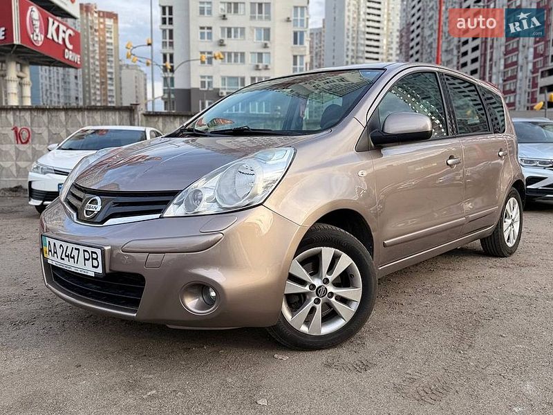 2011 Nissan Note, VIN SJNFCAE11U2148827:plate — фото 1 (autoria)