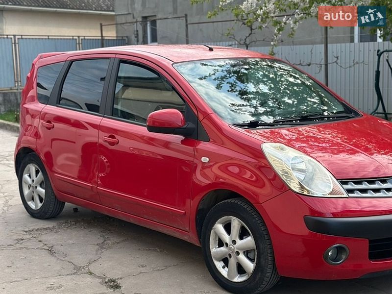 2006 Nissan Note, VIN SJNFAAE11U1054850:plate — фото 1 (autoria)