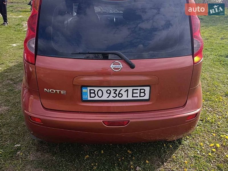 2008 Nissan Note, VIN SJNFAAE11U1267338:plate — фото 1 (autoria)