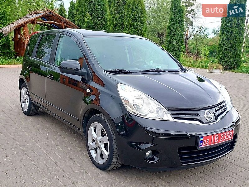 2009 Nissan Note, VIN SJNFAAE11U2044960:plate — фото 1 (autoria)