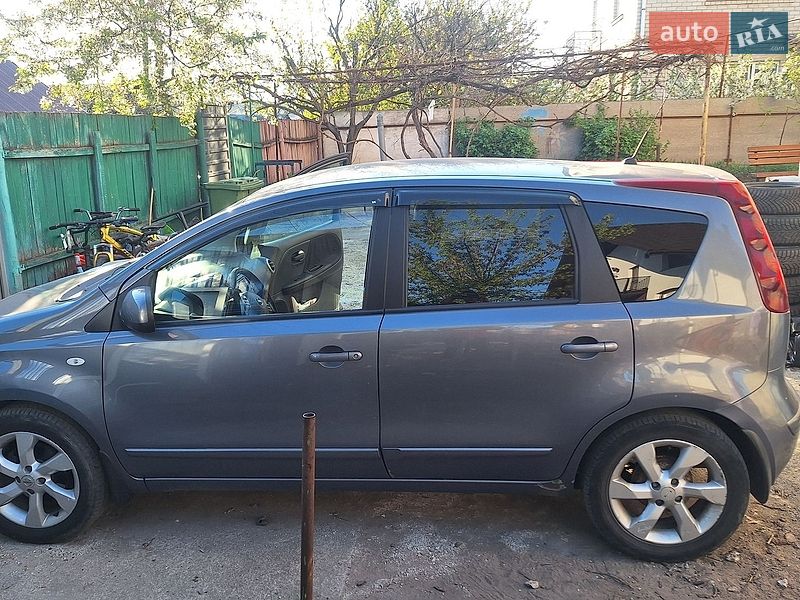 2009 Nissan Note, VIN SJNFDAE11U2042873:plate — фото 1 (autoria)