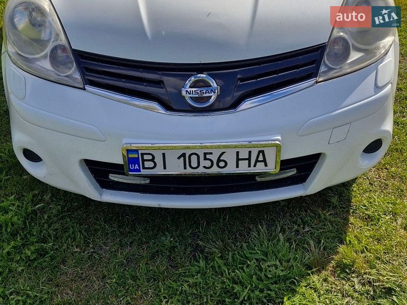 2011 Nissan Note, VIN SJNFCAE11U2147678:plate — фото 1 (autoria)