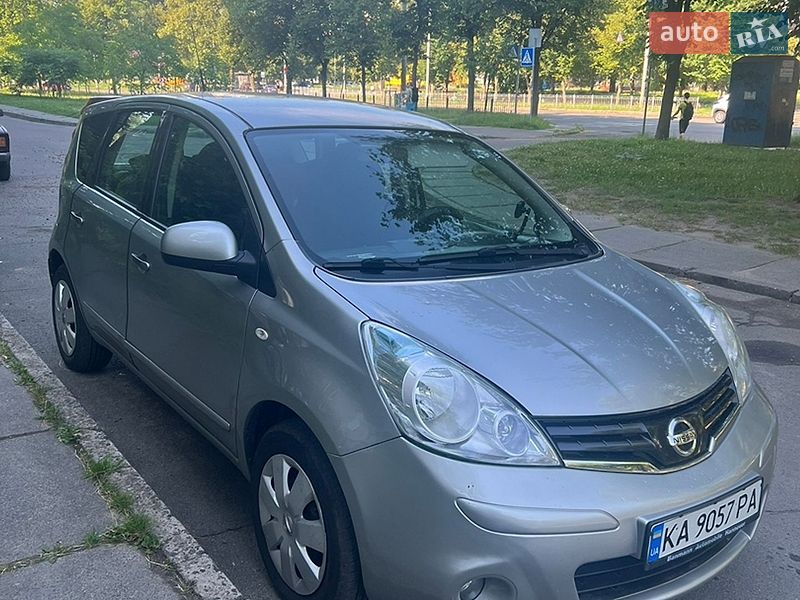 2010 Nissan Note, VIN SJNFCAE11U2099185:plate — фото 1 (autoria)