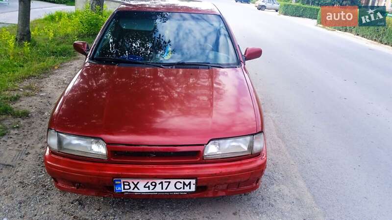Седан Nissan Primera 1995 в Новой Ушице