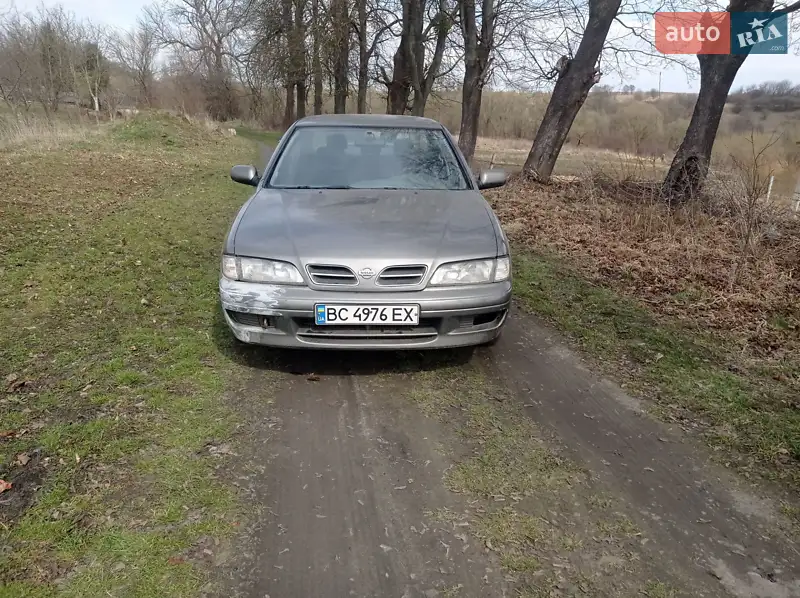 Nissan Primera 1998 VIN SJNBAAP11U0273991 фото оголошення 12 з 47