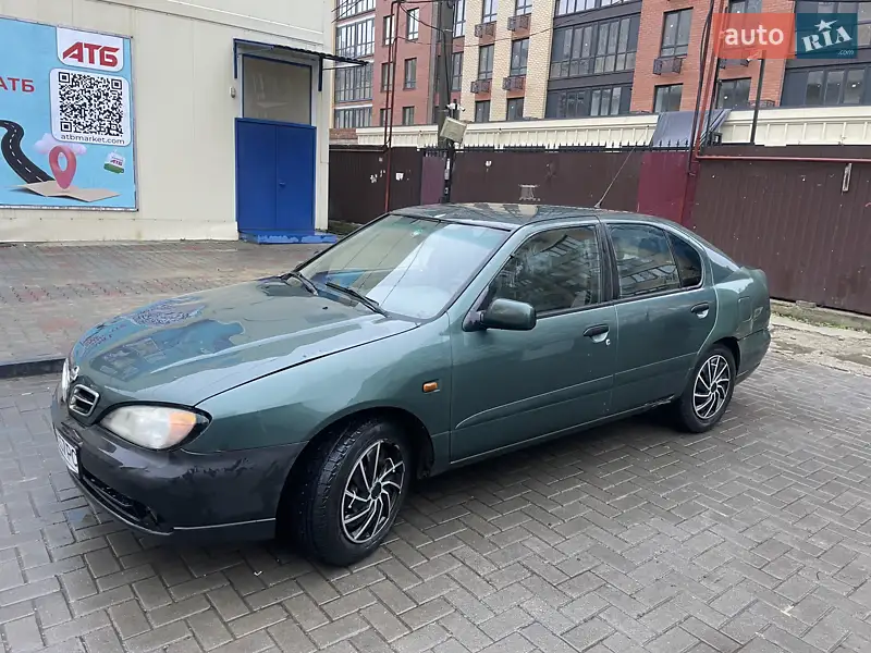 Nissan Primera 1999 VIN SJNFEAP11U0393714 фото оголошення 3 з 45