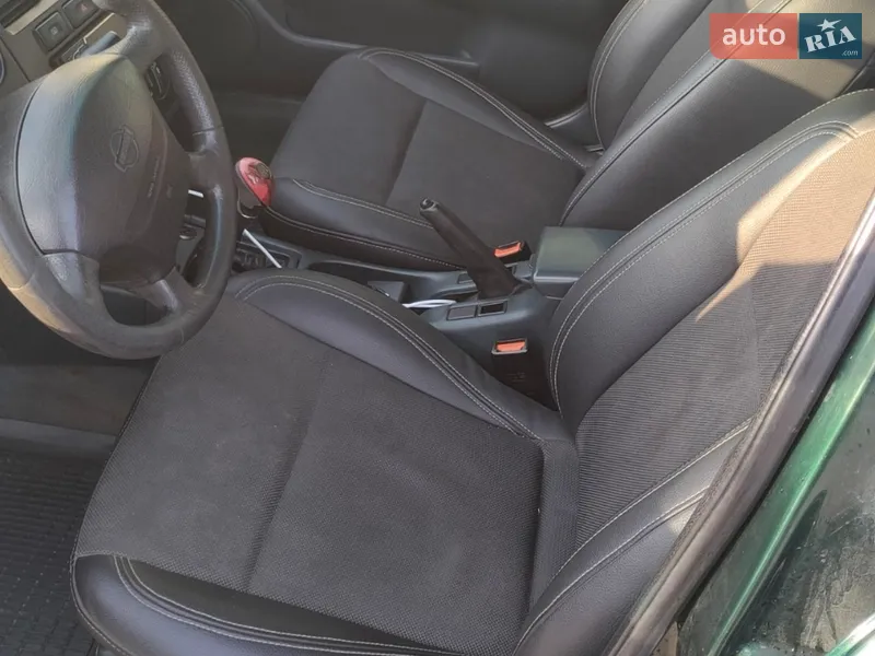 Nissan Primera 1998 VIN SJNBAAP11U0273991 фото оголошення 6 з 47