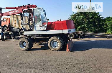 Екскаватор навантажувач O&K MH 5 1993 в 