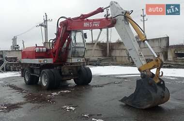 Екскаватор навантажувач O&K MH 5 1993 в 