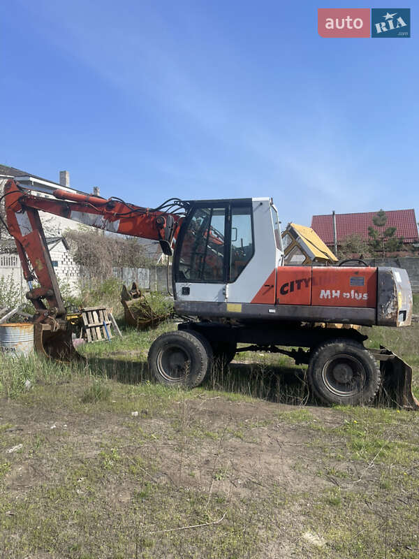 Колесный экскаватор O&K MH 2000 в 