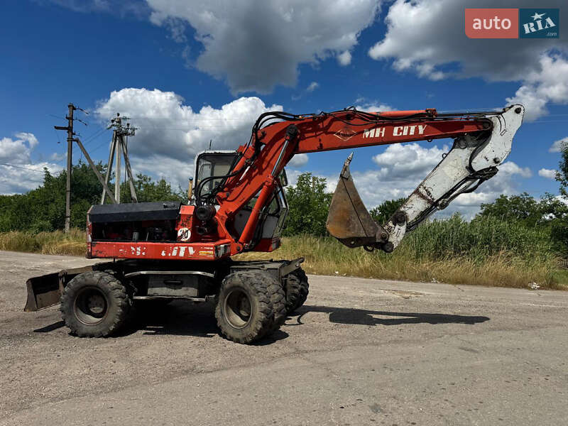 Колісний екскаватор O&K MH 1993 в 