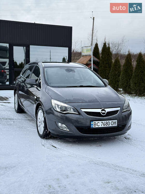 2011 Opel Astra, VIN W0LPE8EA4C8023687:plate — фото 1 (autoria)