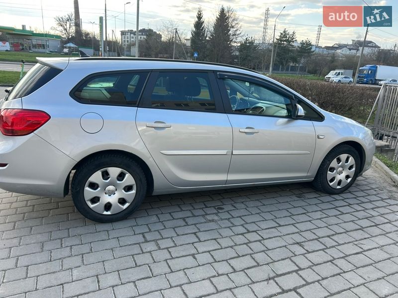2011 Opel Astra, VIN W0LPD8EA4C8034398:plate — фото 1 (autoria)