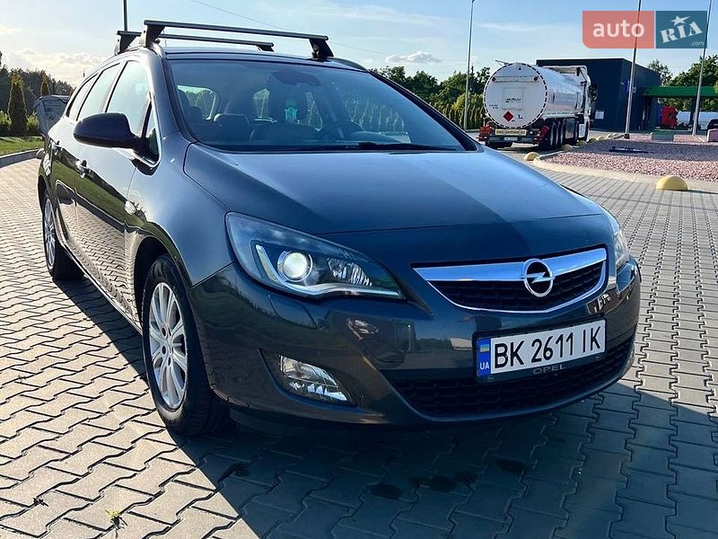 2011 Opel Astra, VIN W0LPE8EF4C8035415:plate — фото 1 (autoria)
