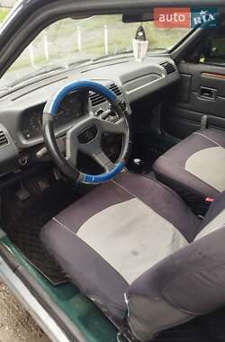 Хетчбек Peugeot 205 1990 в 
