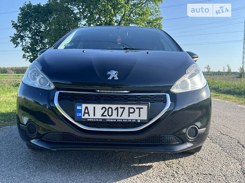 Хэтчбек Peugeot 208 2013 в 