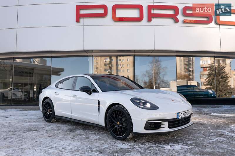 2016 Porsche Panamera, VIN WP0ZZZ97ZHL120394:plate — фото 1 (autoria)
