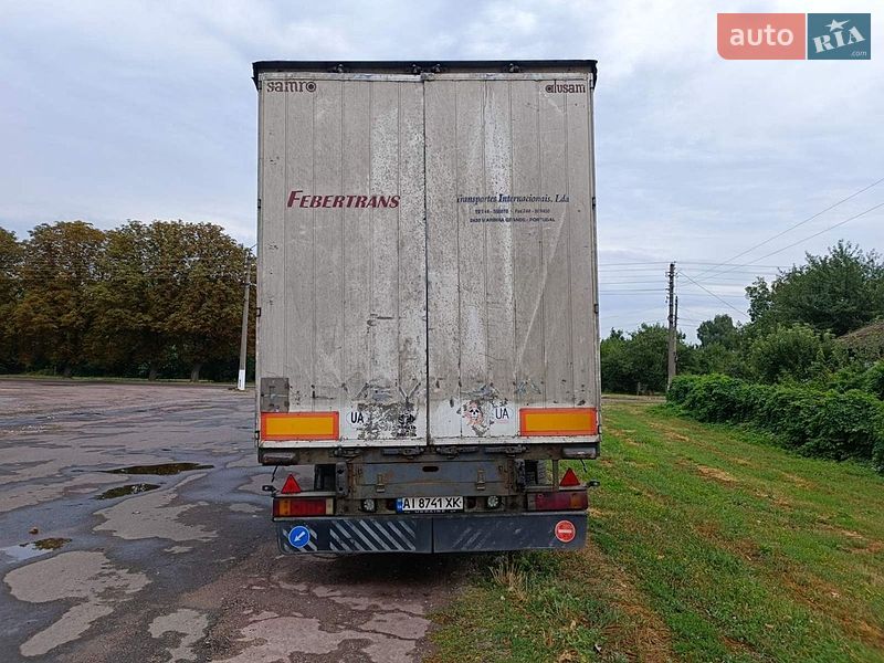 Бортовой полуприцеп Samro Alusam 2002 в Киеве